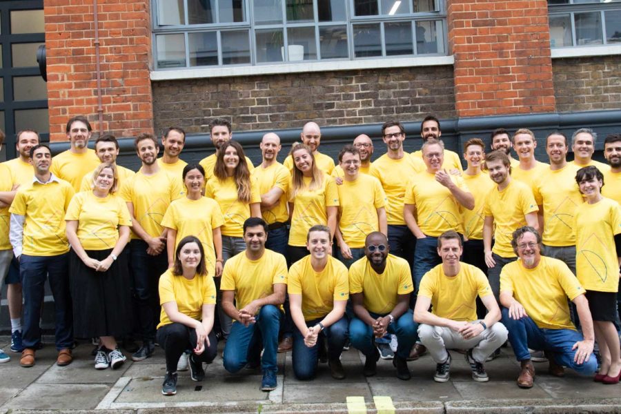 AppyWay Team outside the office in yellow shirts